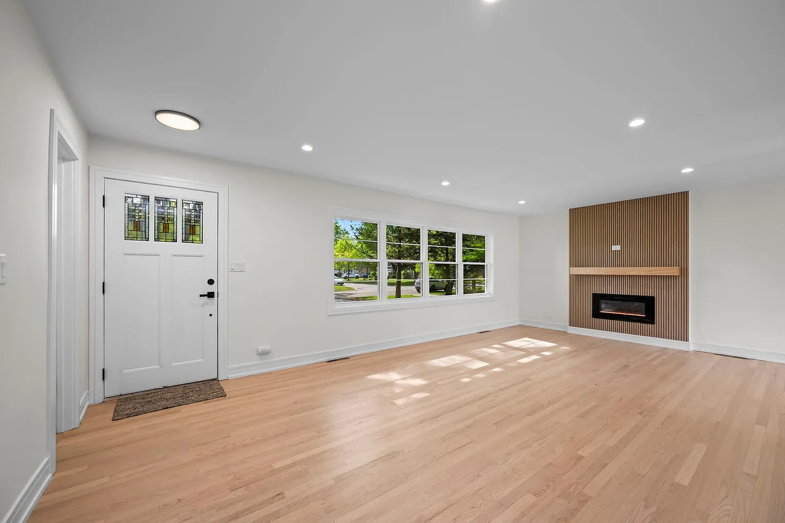 1024 Arbor Ln. — Living room and fireplace